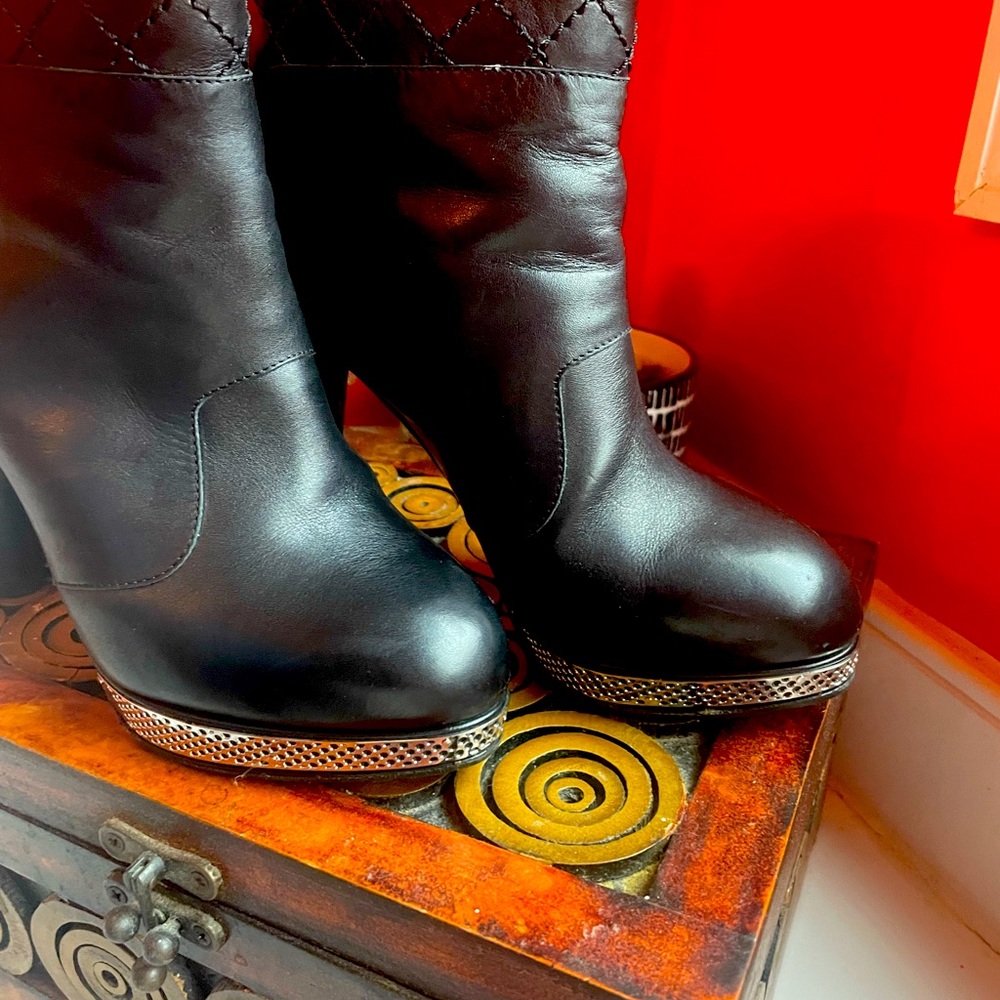 CHANEL calfskin ankle boots.